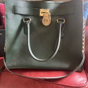 Michael Kors Hamilton Bag NEVER USEDbeautiful racing green color w/gold accents.